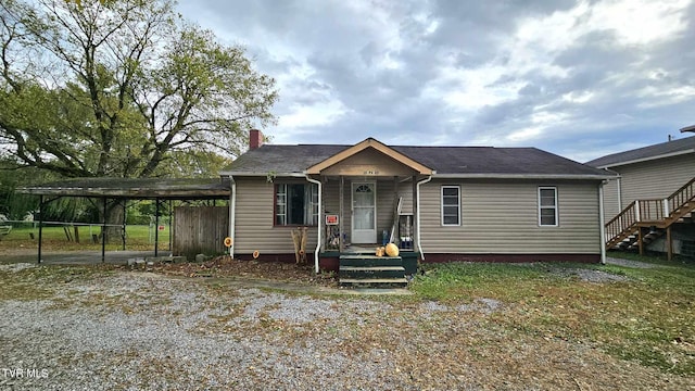 view of front of home with a carport