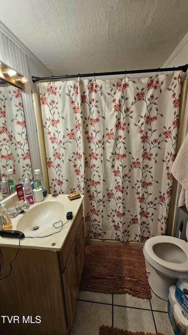 10 Powell Valley Rd, Big Stone Gap, VA 24219 - bathroom featuring a textured ceiling, vanity, ornamental molding, tile patterned flooring, and curtained shower