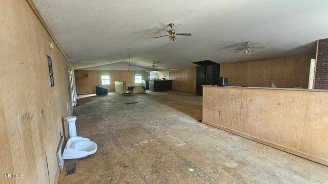 10 Powell Valley Rd, Big Stone Gap, VA 24219 - unfurnished living room featuring vaulted ceiling and a ceiling fan