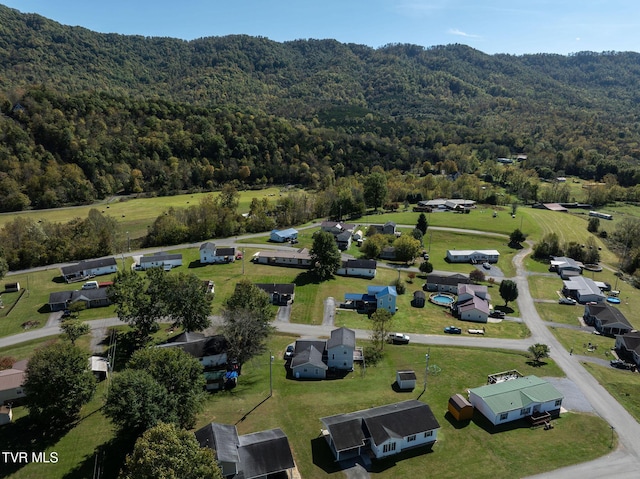 bird's eye view featuring a view of trees