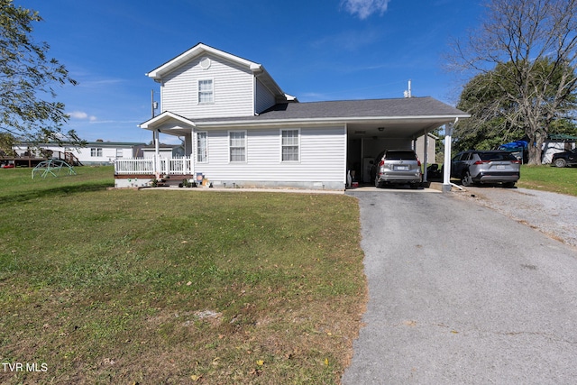 exterior space with a carport and a front lawn