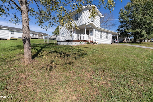 view of front of home featuring a porch and a front lawn