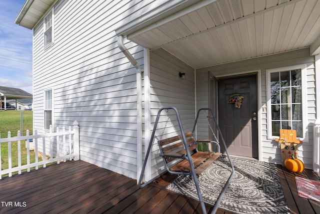 entrance to property with a wooden deck