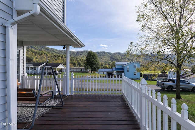 wooden terrace featuring a mountain view