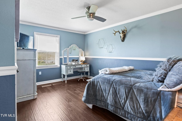 bedroom with ceiling fan, ornamental molding, a textured ceiling, and dark wood-type flooring