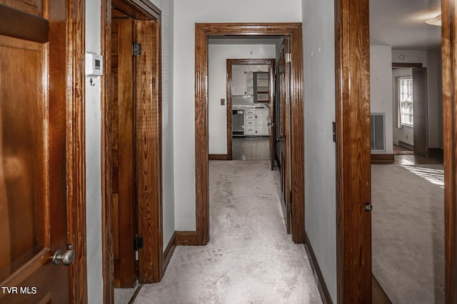 1021 Tusculum Blvd, Greeneville, TN 37745 - hallway with light carpet, baseboards, and visible vents