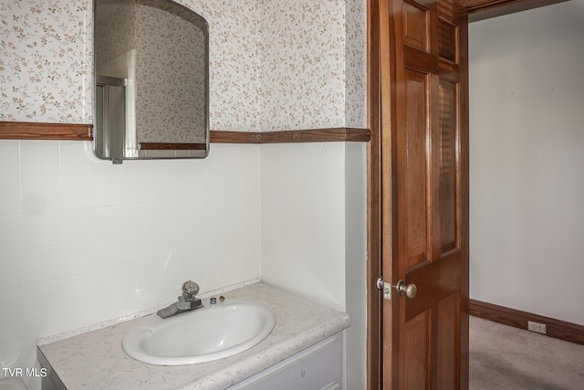 1021 Tusculum Blvd, Greeneville, TN 37745 - bathroom featuring a shower with shower door, wallpapered walls, and vanity
