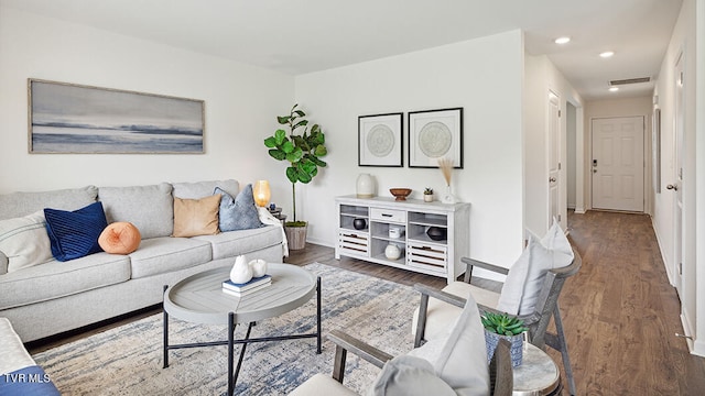 living room with dark wood-type flooring