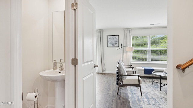 bathroom featuring hardwood / wood-style flooring