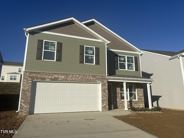 craftsman house with a garage