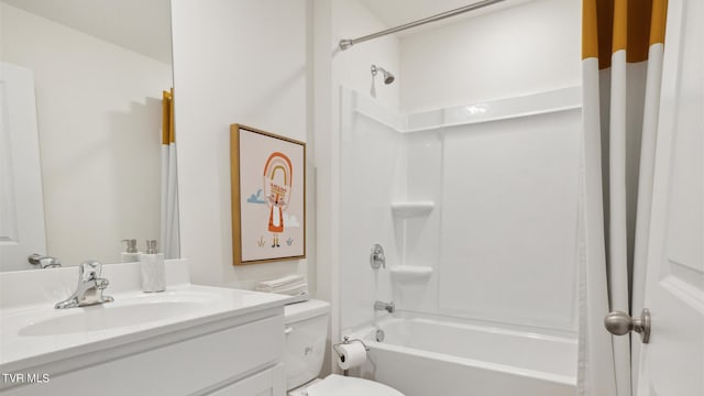 full bathroom with vanity, shower / tub combination, and toilet