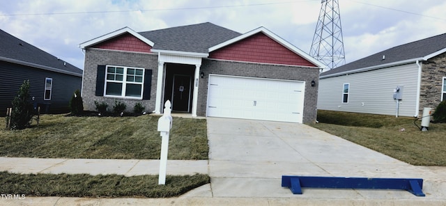 craftsman house with a garage and a front yard