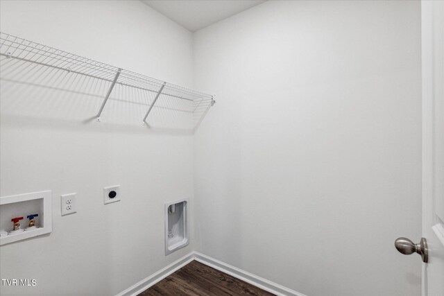 clothes washing area with dark hardwood / wood-style floors, washer hookup, and hookup for an electric dryer