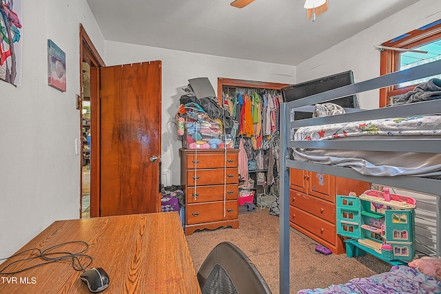 bedroom with a closet and ceiling fan