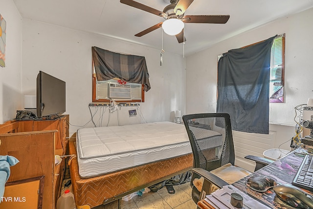 bedroom with ceiling fan and cooling unit