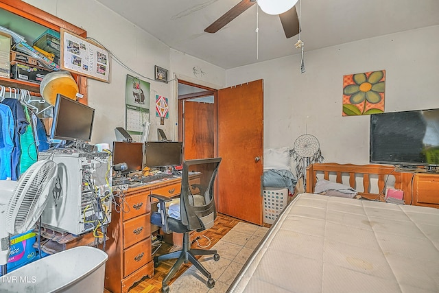 bedroom featuring light parquet flooring and ceiling fan