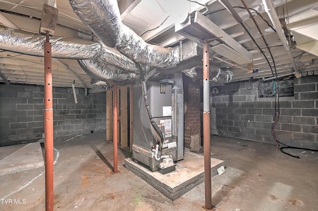 basement featuring heating unit