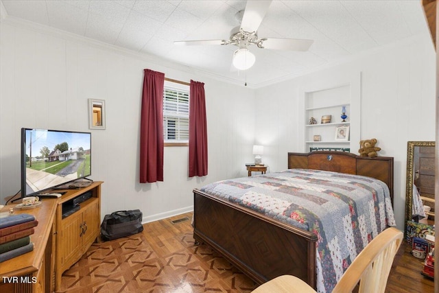 bedroom with crown molding and ceiling fan