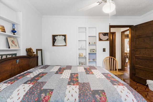 bedroom with ornamental molding, parquet floors, and ceiling fan