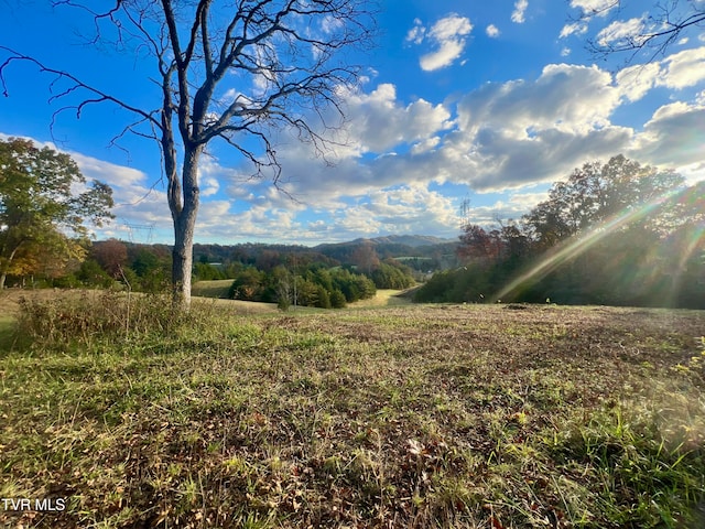 property view of mountains featuring a rural view