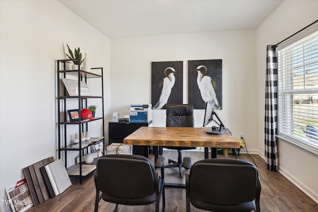 office space featuring baseboards and dark wood-style flooring