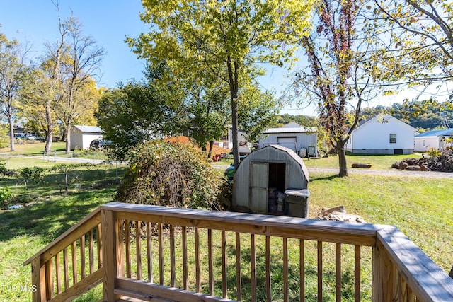 1608 E Fairview Ave, Johnson City, TN 37601 - deck featuring a lawn, an outdoor structure, and a storage shed