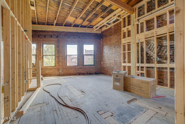 miscellaneous room featuring brick wall