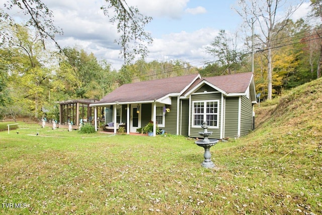 view of front of home with a front yard