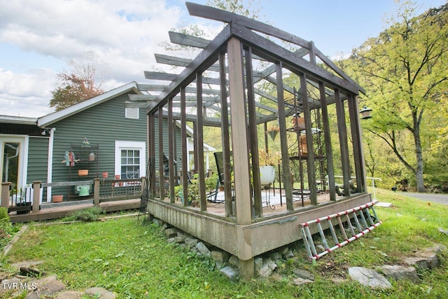 exterior space featuring a sunroom and a lawn