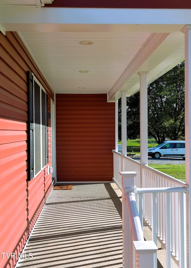 balcony featuring a porch