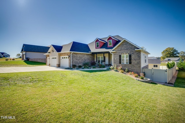 craftsman-style home featuring a garage and a front lawn