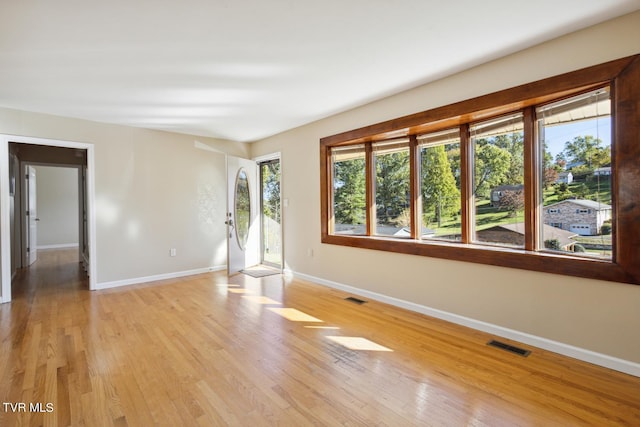 empty room featuring light hardwood / wood-style floors