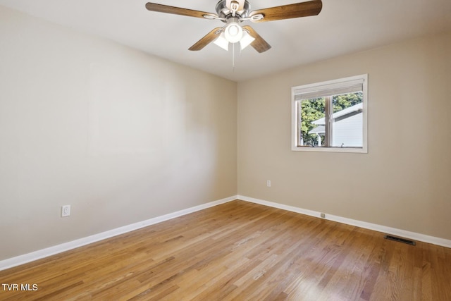 unfurnished room featuring light hardwood / wood-style floors and ceiling fan