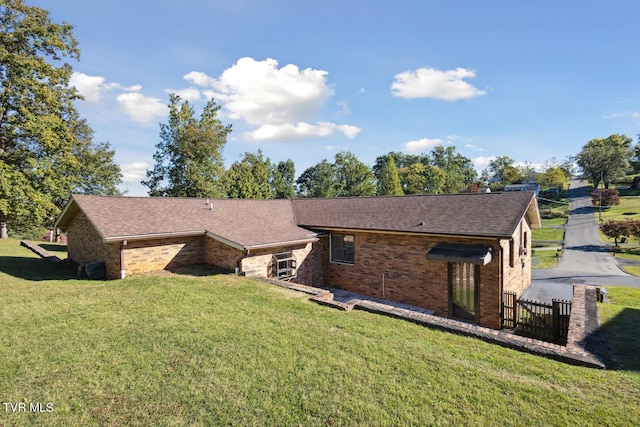 exterior space with a yard and a patio area