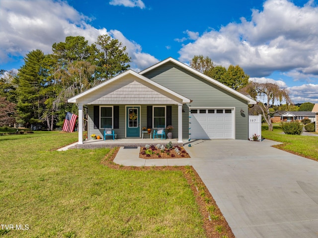 view of front of house with a front yard, a porch, and a garage