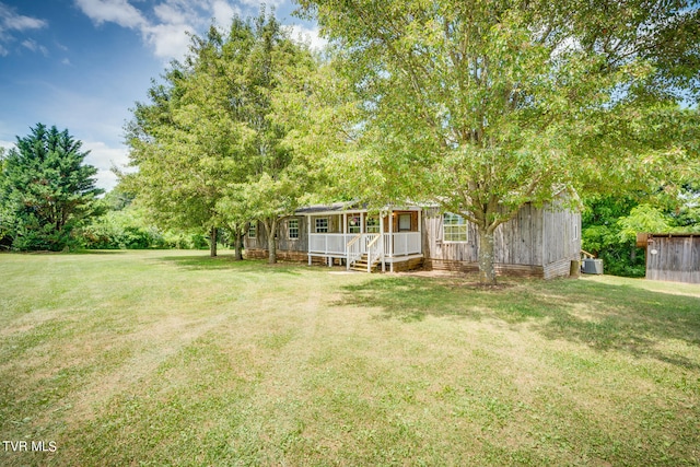 view of yard featuring a porch