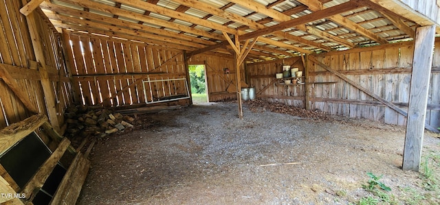 miscellaneous room featuring lofted ceiling