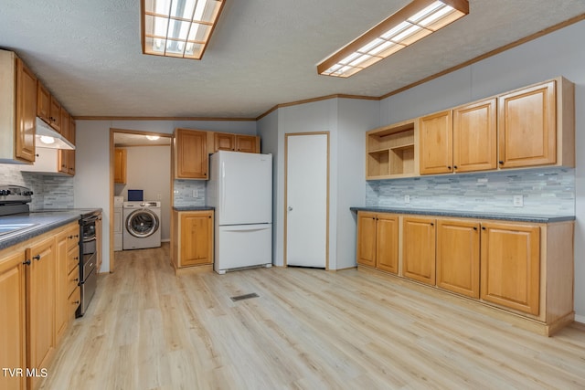 kitchen with separate washer and dryer, light hardwood / wood-style flooring, white refrigerator, black / electric stove, and ornamental molding