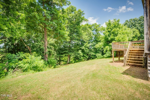 view of yard with a deck