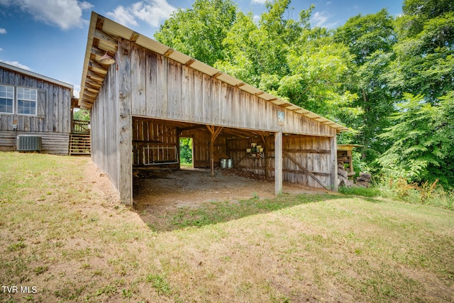 view of outdoor structure featuring central air condition unit