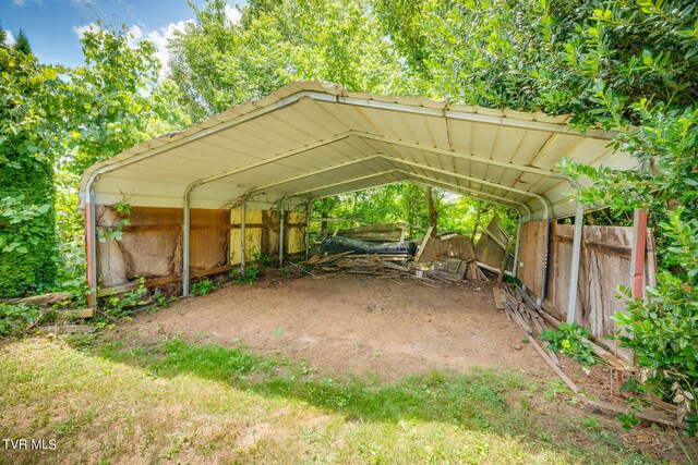 view of parking featuring a carport