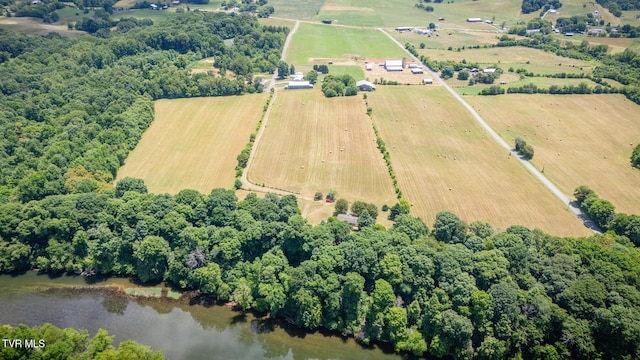 aerial view featuring a rural view and a water view