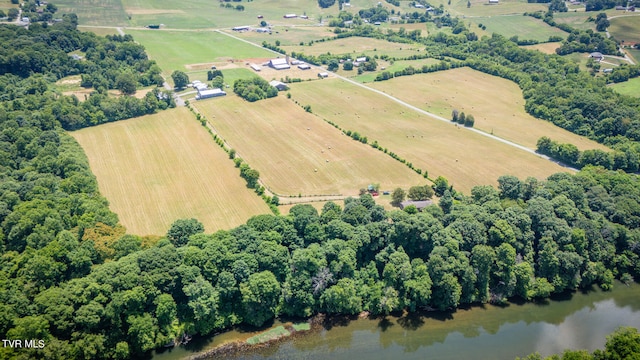 bird's eye view featuring a rural view and a water view