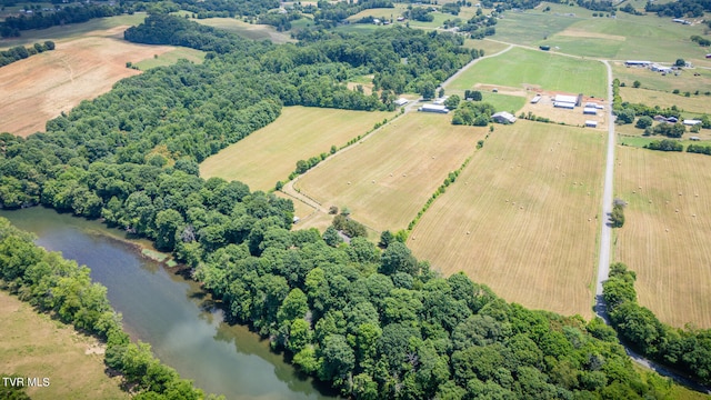 bird's eye view featuring a water view and a rural view