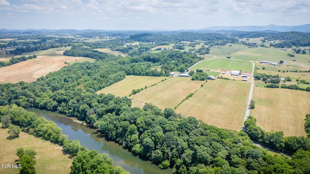 bird's eye view featuring a water and mountain view and a rural view