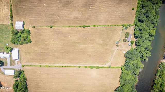 birds eye view of property featuring a rural view