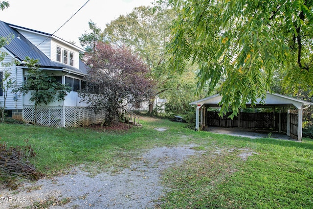 view of yard featuring a carport