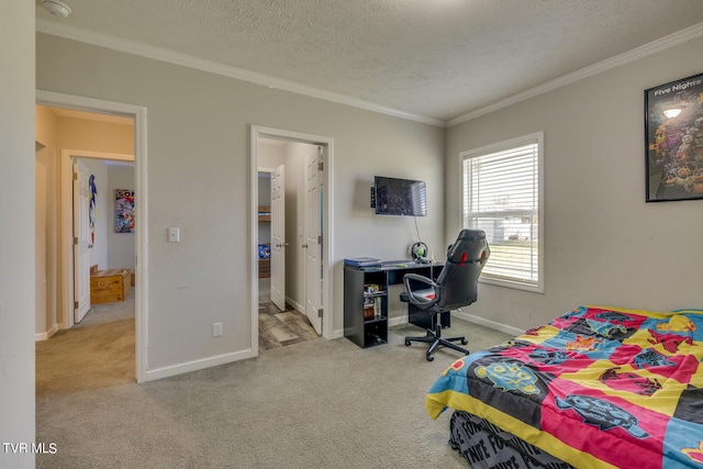 bedroom featuring light carpet, a textured ceiling, ensuite bathroom, and ornamental molding