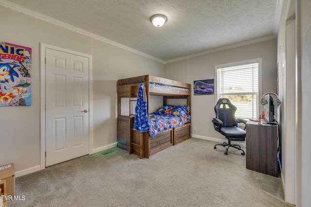 bedroom featuring light carpet, crown molding, and a textured ceiling