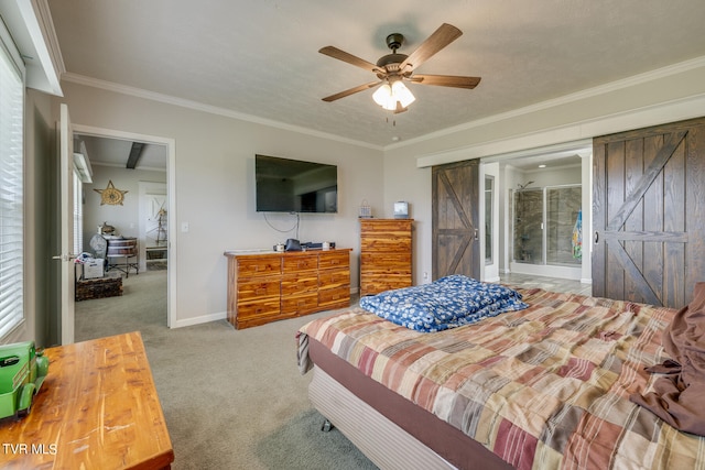 bedroom with multiple windows, carpet, ceiling fan, a barn door, and ornamental molding